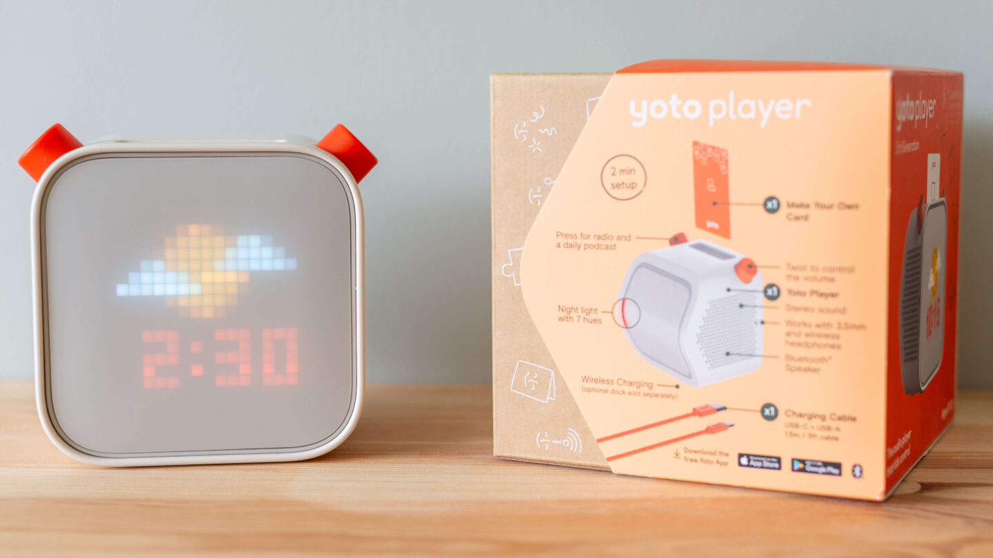New Yoto Player 3rd Generation sitting on shelf next to its original box.